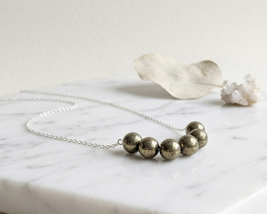 925 Sterling Silver Pyrite Bead Curved Bar Necklace